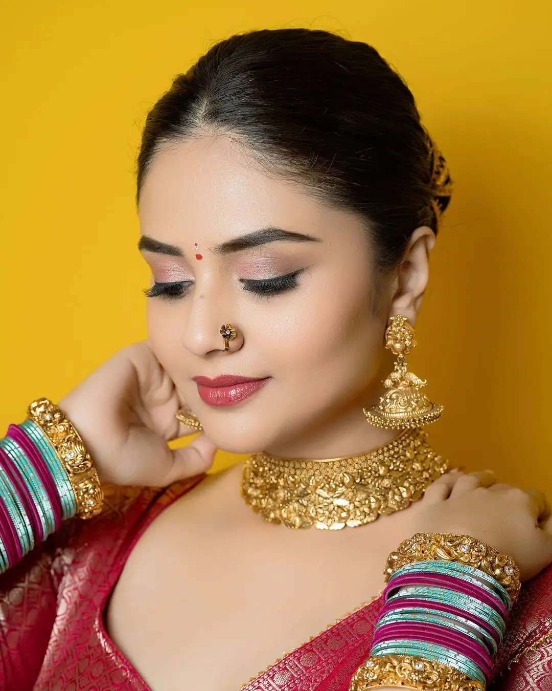 Telugu Actress Sreemukhi Stills In Green Lehenga Choli